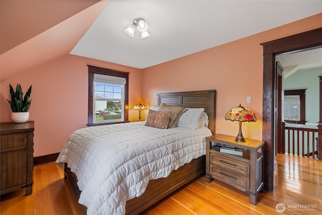 814 E Wright Ave, Tacoma, WA 98404 - bedroom featuring lofted ceiling and light wood-style flooring