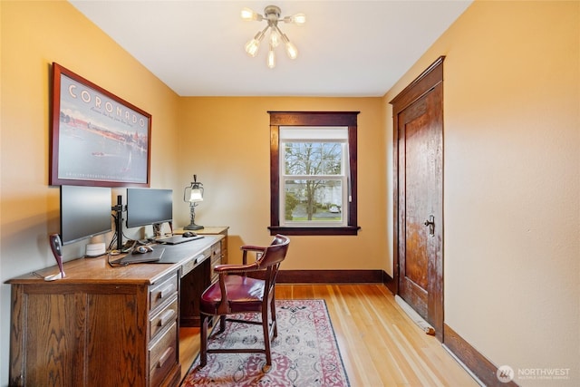 814 E Wright Ave, Tacoma, WA 98404 - home office with light wood finished floors and a chandelier