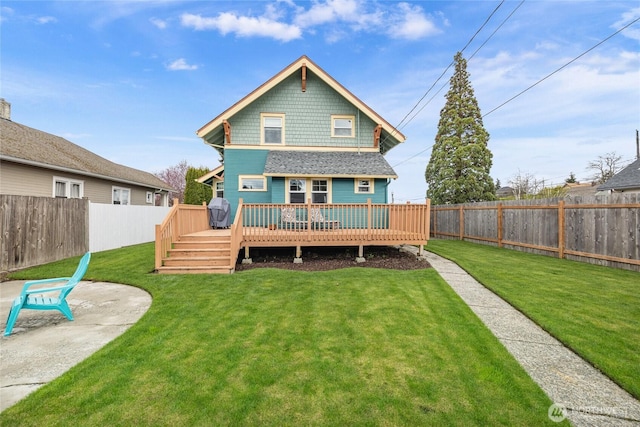 814 E Wright Ave, Tacoma, WA 98404 - back of property with a fenced backyard, a deck, and a patio
