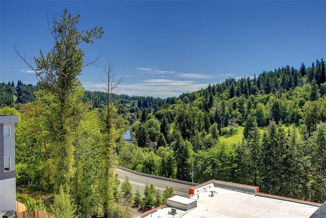 8818 NE 173rd Pl Unit B, Bothell, WA 98011 - mountain view with a heavily wooded area