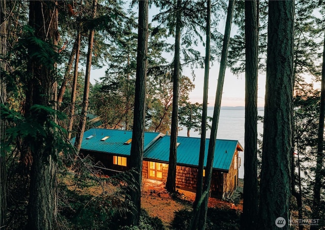 449 Madrona Dr, Friday Harbor, WA 98250 - exterior space featuring metal roof, a standing seam roof, and a water view