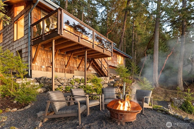 449 Madrona Dr, Friday Harbor, WA 98250 - view of patio / terrace with a fire pit and stairway
