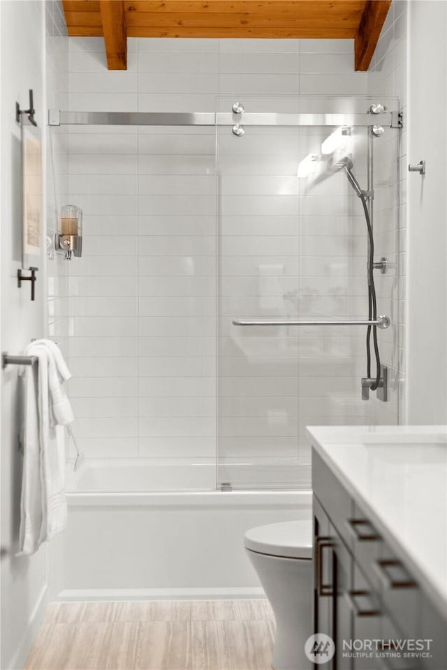 449 Madrona Dr, Friday Harbor, WA 98250 - full bath with beam ceiling, toilet, and shower / tub combination