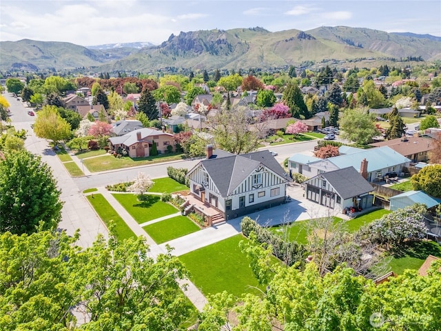 drone / aerial view featuring a mountain view and a residential view