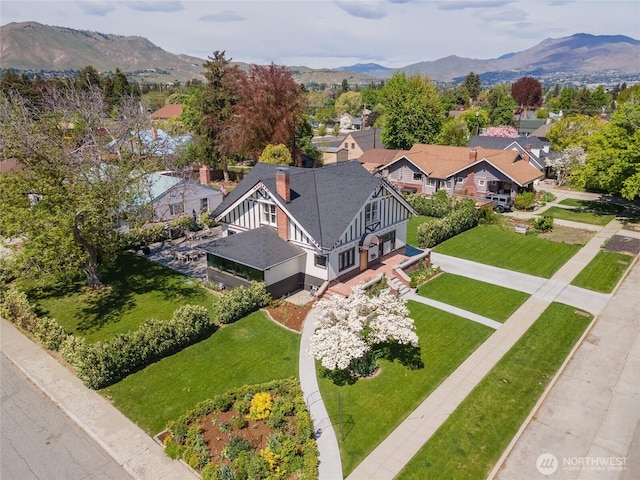 bird's eye view with a residential view and a mountain view