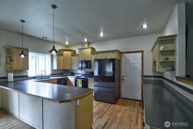 kitchen with a peninsula, light wood-style flooring, open shelves, dark countertops, and black appliances