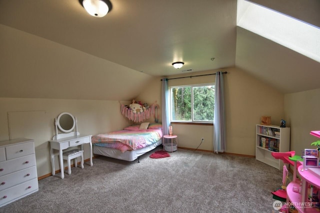 carpeted bedroom with baseboards and lofted ceiling