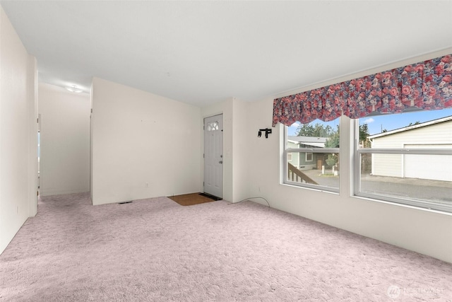 spare room with carpet