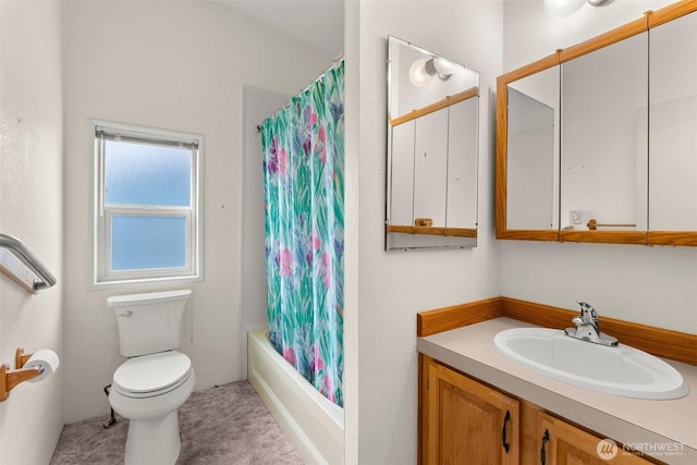 full bathroom with shower / bath combo with shower curtain, vanity, and toilet