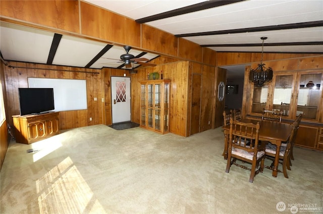 5115 88th Street Ct E Unit 29, Tacoma, WA 98446 - dining space with carpet, wooden walls, and ceiling fan with notable chandelier