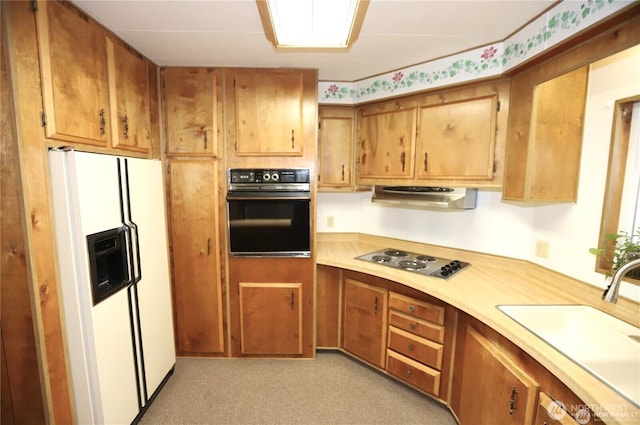 5115 88th Street Ct E Unit 29, Tacoma, WA 98446 - kitchen featuring light countertops, electric stovetop, oven, white fridge with ice dispenser, and a sink