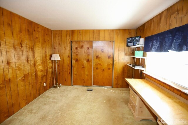 5115 88th Street Ct E Unit 29, Tacoma, WA 98446 - interior space featuring visible vents, wooden walls, and light colored carpet