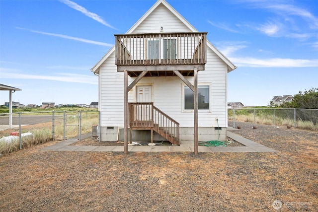 view of outdoor structure with cooling unit and fence