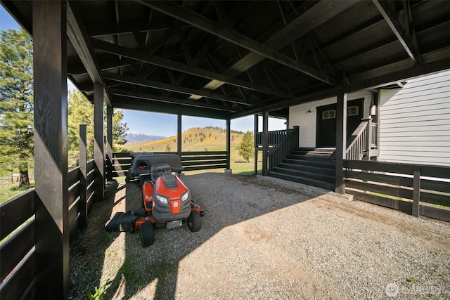 696 Texas Creek Rd, Carlton, WA 98814 - view of parking / parking lot with a mountain view and a carport
