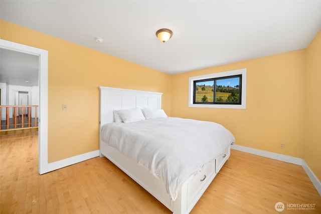 696 Texas Creek Rd, Carlton, WA 98814 - bedroom featuring baseboards and light wood-type flooring