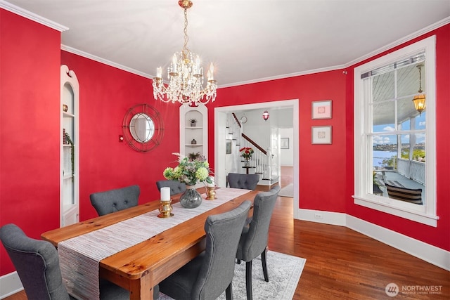 4201 N Mason St, Tacoma, WA 98407 - dining room featuring stairs, a chandelier, wood finished floors, ornamental molding, and baseboards