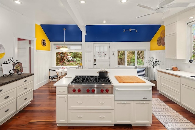 4201 N Mason St, Tacoma, WA 98407 - kitchen with stainless steel gas cooktop, ceiling fan, white cabinetry, dark wood-style floors, and a warming drawer