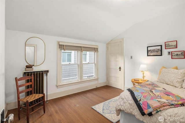 4201 N Mason St, Tacoma, WA 98407 - bedroom with wood finished floors, lofted ceiling, and baseboards