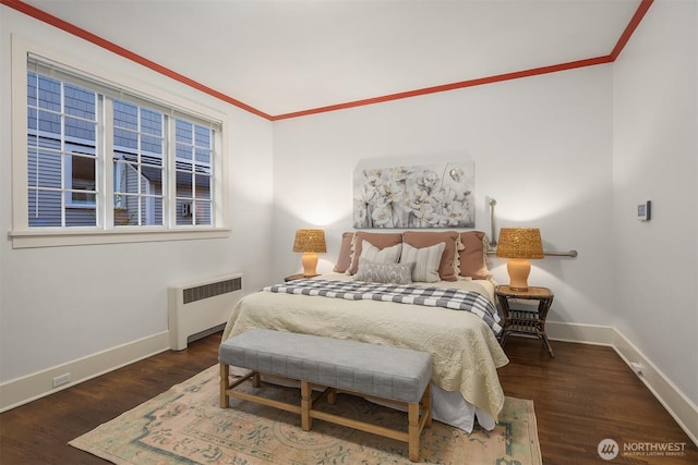 4201 N Mason St, Tacoma, WA 98407 - bedroom with radiator heating unit, baseboards, crown molding, and wood finished floors