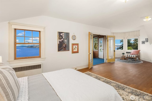 4201 N Mason St, Tacoma, WA 98407 - bedroom with radiator, wood finished floors, and baseboards