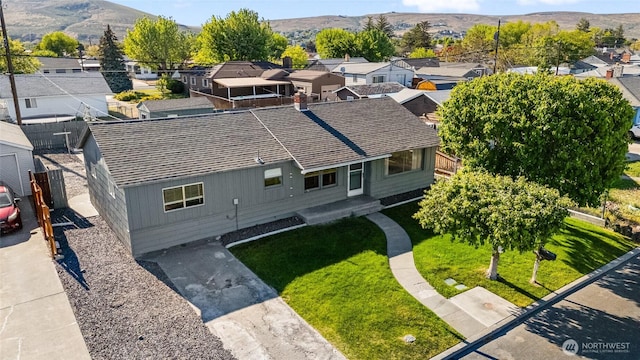 129 G St SE, Ephrata, WA 98823 - aerial perspective of suburban area with a mountain backdrop