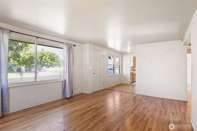 129 G St SE, Ephrata, WA 98823 - spare room with light wood-style flooring and baseboards