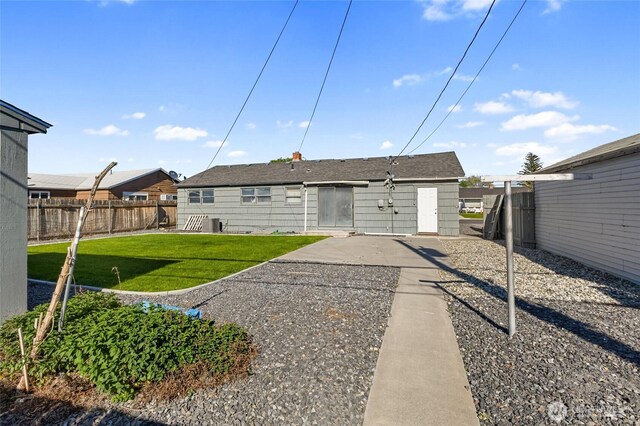 129 G St SE, Ephrata, WA 98823 - back of house featuring a patio