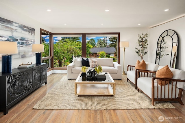 living room featuring wood finished floors and recessed lighting