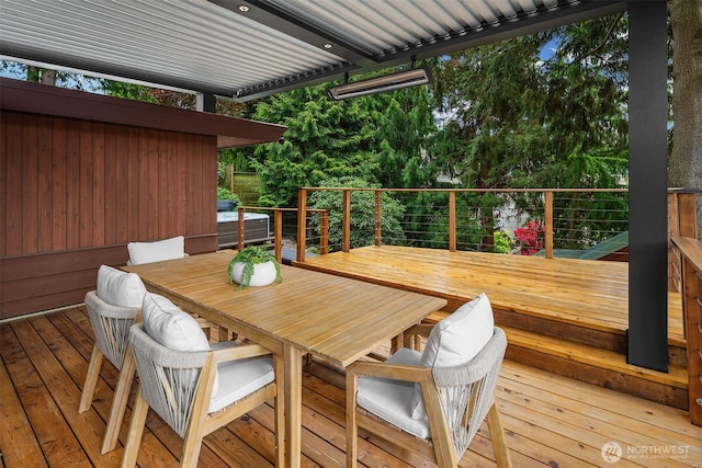 deck with outdoor dining area