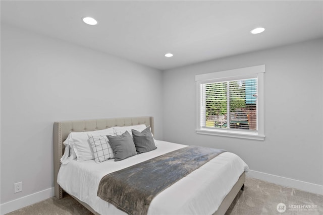carpeted bedroom with baseboards and recessed lighting