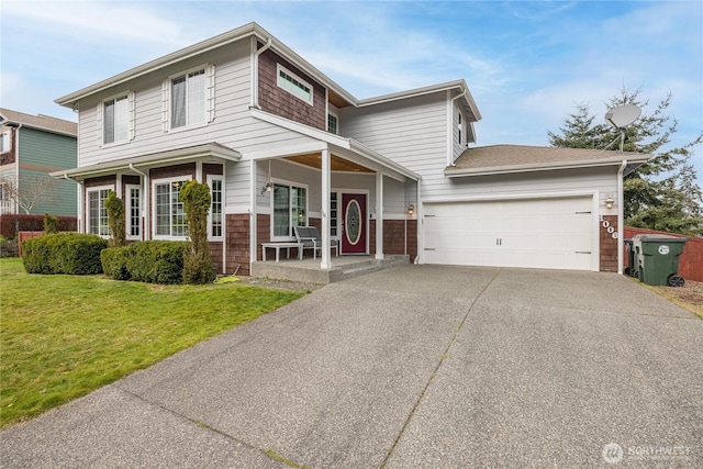 1006 Cathleen St, Port Angeles, WA 98363 - traditional-style house featuring an attached garage, covered porch, a front lawn, and concrete driveway