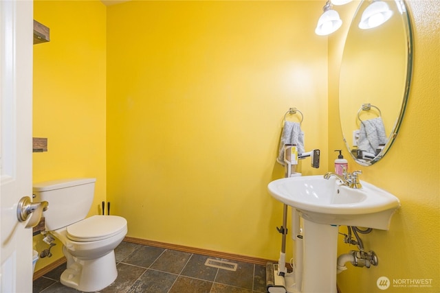 1006 Cathleen St, Port Angeles, WA 98363 - bathroom with baseboards, visible vents, and toilet