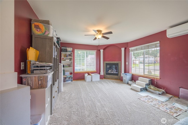 1006 Cathleen St, Port Angeles, WA 98363 - carpeted living area with a fireplace, a wall mounted air conditioner, and a ceiling fan