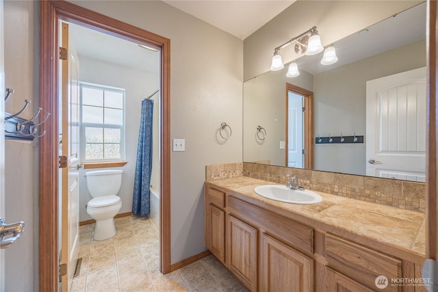 1006 Cathleen St, Port Angeles, WA 98363 - full bathroom with tile patterned floors, toilet, vanity, baseboards, and shower / bath combination with curtain