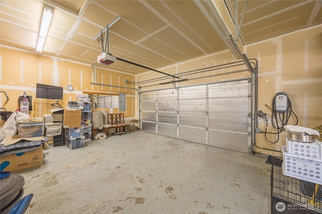 1006 Cathleen St, Port Angeles, WA 98363 - garage featuring electric panel and a garage door opener