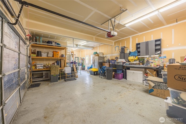 1006 Cathleen St, Port Angeles, WA 98363 - garage featuring a workshop area and a garage door opener