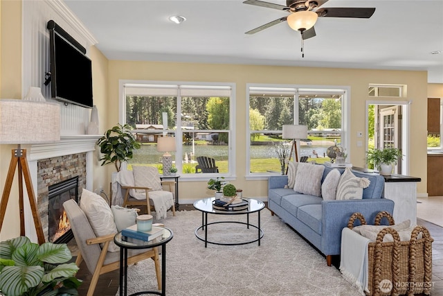 1140 Twin Lakes Rd, Cle Elum, WA 98922 - living room featuring ceiling fan and a fireplace