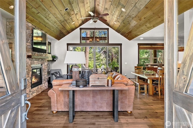 31 Powder Cap Ct, Cle Elum, WA 98922 - living room featuring a fireplace, a ceiling fan, wood ceiling, wood finished floors, and lofted ceiling