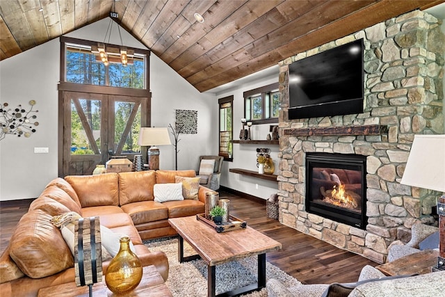 31 Powder Cap Ct, Cle Elum, WA 98922 - living area featuring high vaulted ceiling, a stone fireplace, wood ceiling, wood finished floors, and a notable chandelier