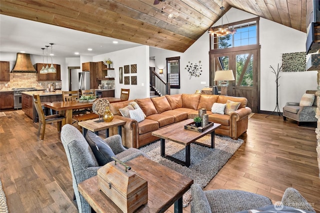 31 Powder Cap Ct, Cle Elum, WA 98922 - living room featuring stairway, light wood-type flooring, an inviting chandelier, and wood ceiling