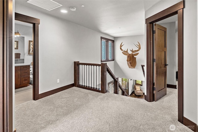 31 Powder Cap Ct, Cle Elum, WA 98922 - corridor with carpet flooring, baseboards, an upstairs landing, and recessed lighting