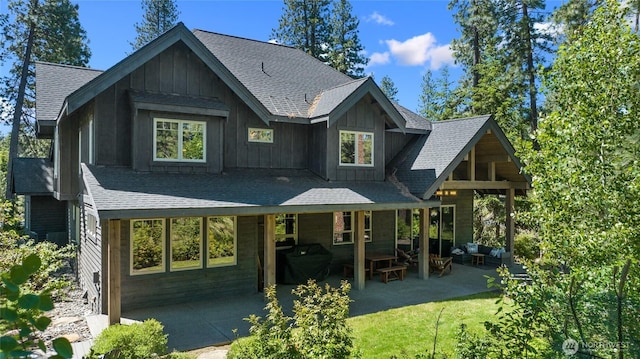31 Powder Cap Ct, Cle Elum, WA 98922 - rear view of house with a patio area, roof with shingles, and board and batten siding