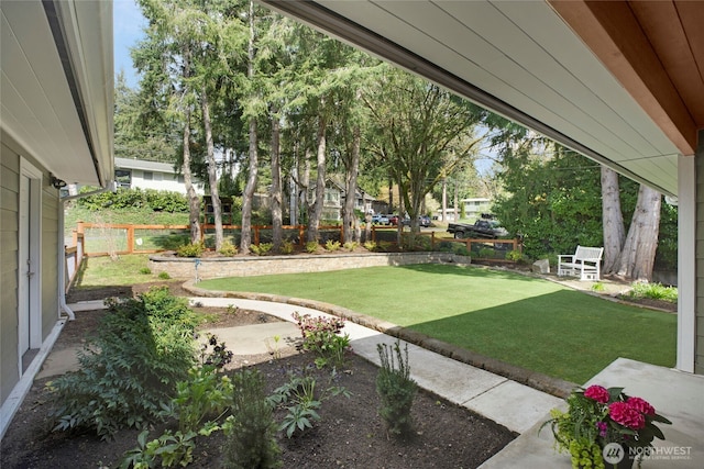 view of yard featuring fence