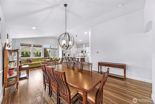 dining room with dark wood finished floors, recessed lighting, lofted ceiling, baseboards, and a notable chandelier