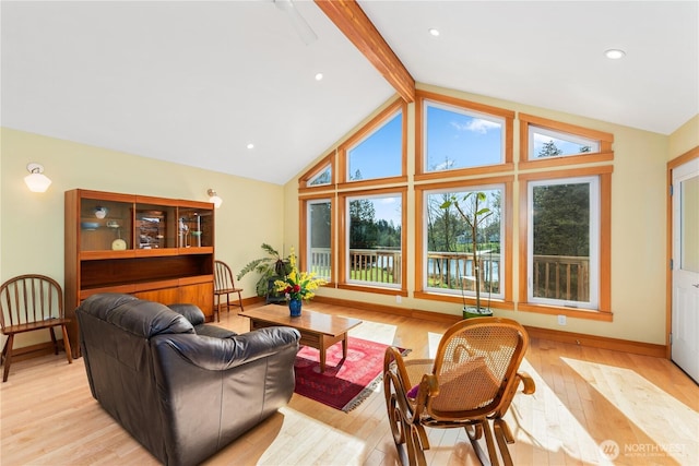 324 Gill Ln, Friday Harbor, WA 98250 - living area featuring light wood-style flooring, a healthy amount of sunlight, beamed ceiling, and baseboards