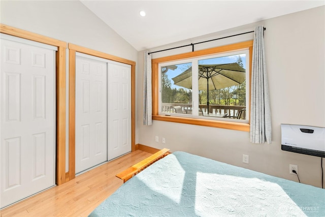 324 Gill Ln, Friday Harbor, WA 98250 - bedroom with recessed lighting, lofted ceiling, a closet, and wood finished floors