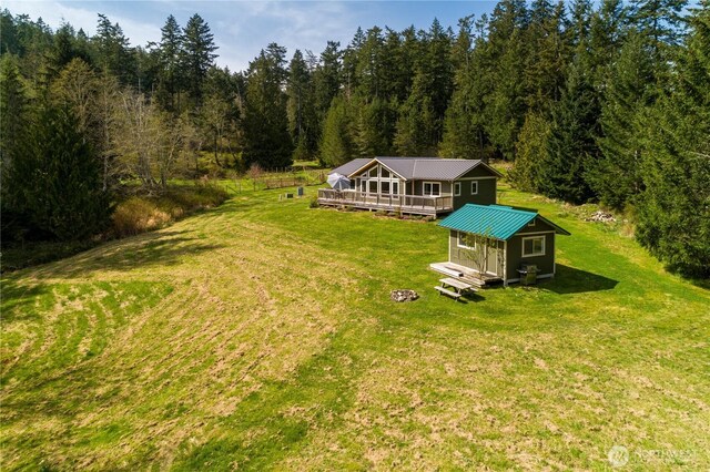 324 Gill Ln, Friday Harbor, WA 98250 - drone / aerial view with a forest view