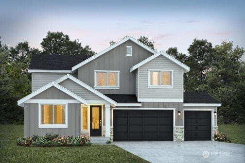 19457 116th St E, Bonney Lake, WA 98391 - view of front of property with board and batten siding, concrete driveway, and a yard