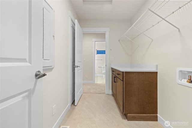 19457 116th St E, Bonney Lake, WA 98391 - laundry room with hookup for a washing machine and baseboards