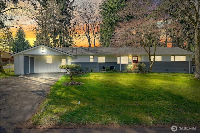 14207 6th Ave S, Burien, WA 98168 - ranch-style home with a front yard, an attached carport, and driveway